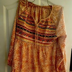 Gently used small orange beige cheetah hobo shirt